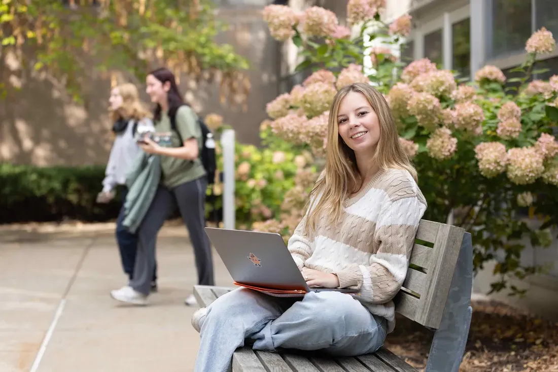 A public relations major at Newhouse, Leana Genovese, is pictured outside the school.